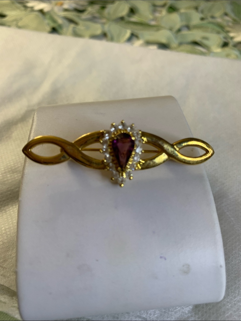 Gold-Tone Brooch with Purple Teardrop Center